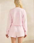BTTRMMT Pink Sweet Easy Sweatshirt back view showing relaxed cropped fit, long sleeves, and soft pink lightweight fabric