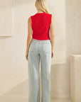 Back view of BTTRMMT Rhea Knit Vest showing textured red knit fabric and sleeveless relaxed fit.