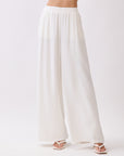 Close-up of BTTRMMT Ivory Olivyn Set pants showing lightweight wide-leg design with elastic waistband and side pockets.