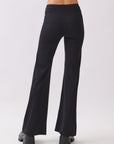 Back view of BTTRMMT Calista Fit Flare Pants in black with a smooth waistband, soft stretch fabric, and clean flared leg shape.
