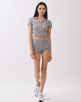 BTTRMMT Lia Ripped Zip Up Top front view with cropped fit, short sleeves, and front zip detail