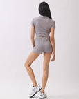 BTTRMMT Lia Ripped Zip Up Top back view highlighting fitted shape, short sleeves, and clean zip-back finish