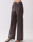 BTTRMMT Vera Faux Leather Pants side view highlighting smooth faux leather and comfortable waistband