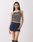 BTTRMMT Black Striped Ribbed Tank Top โ fitted cropped cami paired with denim mini skirt and tall black boots.