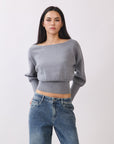 Model wearing BTTRMMT Gray Tessa Boatneck Sweater, ribbed off-shoulder knit with long sleeves.