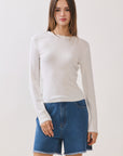 BTTRMMT White Selene Rib Tee front view with fitted silhouette, long sleeves, and ribbed texture
