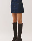 BTTRMMT Romi Denim Skort side view showing clean mini length and structured denim fit