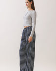 BTTRMMT Ellie Striped Pants side view showing flowy wide-leg silhouette and lightweight striped fabric