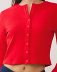 BTTRMMT Red Sophie Ribbed Button Cardigan close-up highlighting ribbed fabric, tonal buttons, and clean neckline