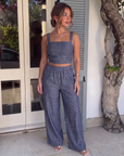 Women's denim blue matching set with cropped square-neck top and wide-leg pants
