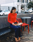 BTTRMMT Red Sophie Ribbed Button Cardigan styled in downtown Los Angeles for a modern everyday street look