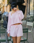 BTTRMMT Pink Sweet Easy Flow Shorts front view worn in downtown Los Angeles with relaxed fit and soft flowy fabric