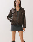 BTTRMMT Reign Faux Leather Jacket front view with oversized fit, zip front, and smooth faux leather