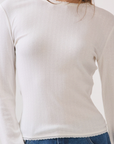 BTTRMMT White Selene Rib Tee close-up of soft ribbed knit texture and subtle stretch