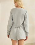 Back view of the BTTRMMT Gray Sweet Easy Sweatshirt showcasing the relaxed cropped fit, long sleeves, and soft heather gray fabric.