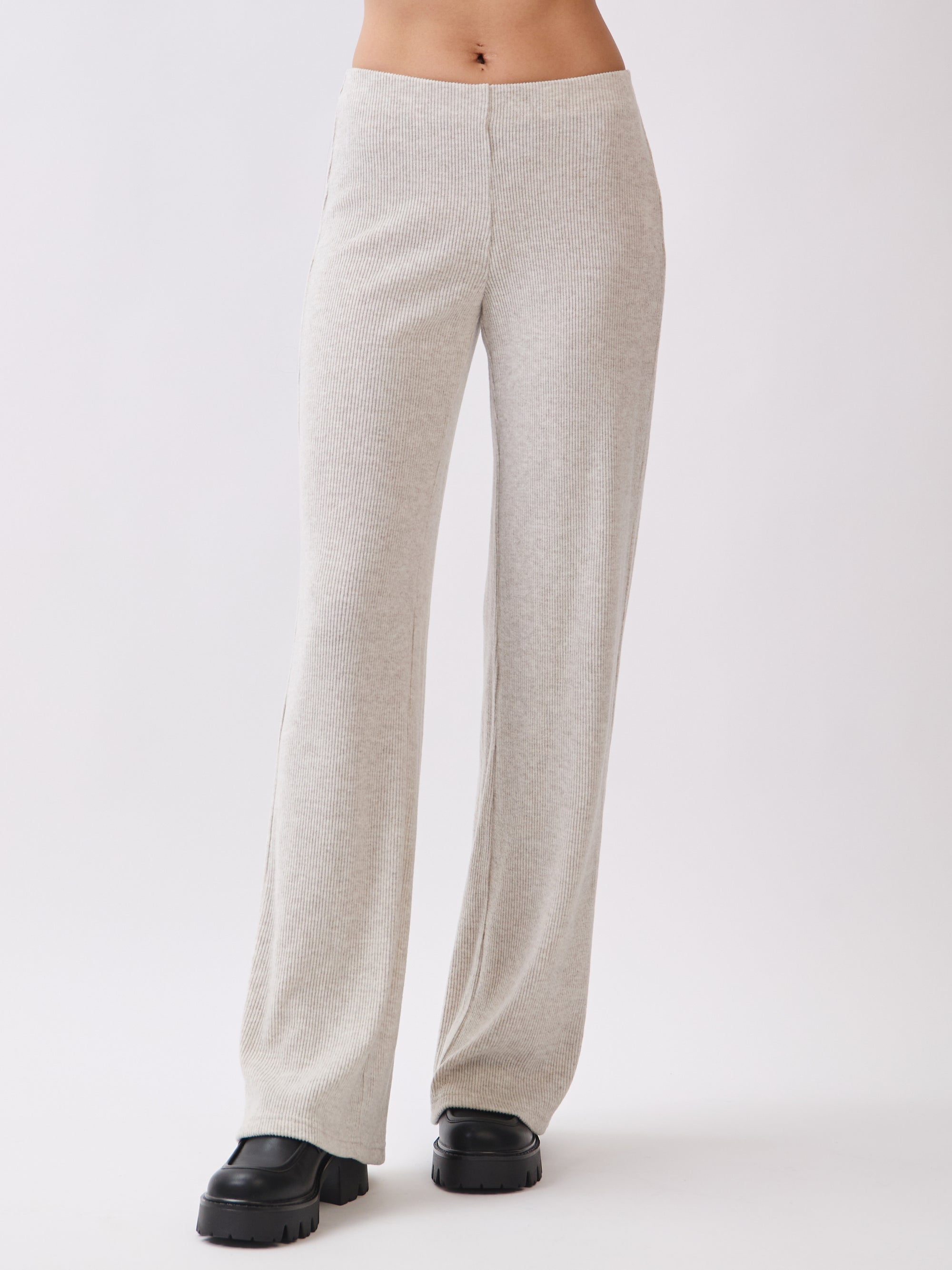 Front view of BTTRMMT Rae Wide Rib Pant in light beige, featuring soft ribbed texture, relaxed fit, and wide-leg silhouette.