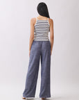 Back view of BTTRMMT Ivory and Navy Striped Ribbed Tank Top showing slim straps, ribbed texture, and cropped fit