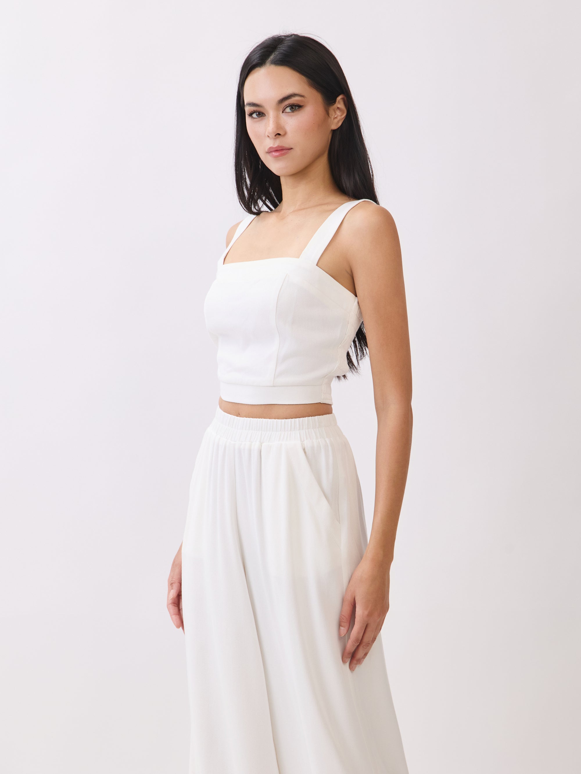 Close-up view of BTTRMMT Ivory Olivyn Set showing cropped square-neck top with wide straps and textured fabric detail.