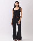 BTTRMMT Black Sophia Pants with a wide-leg fit, front seam detail, and a mid-rise tailored waistband for a sleek, modern look.