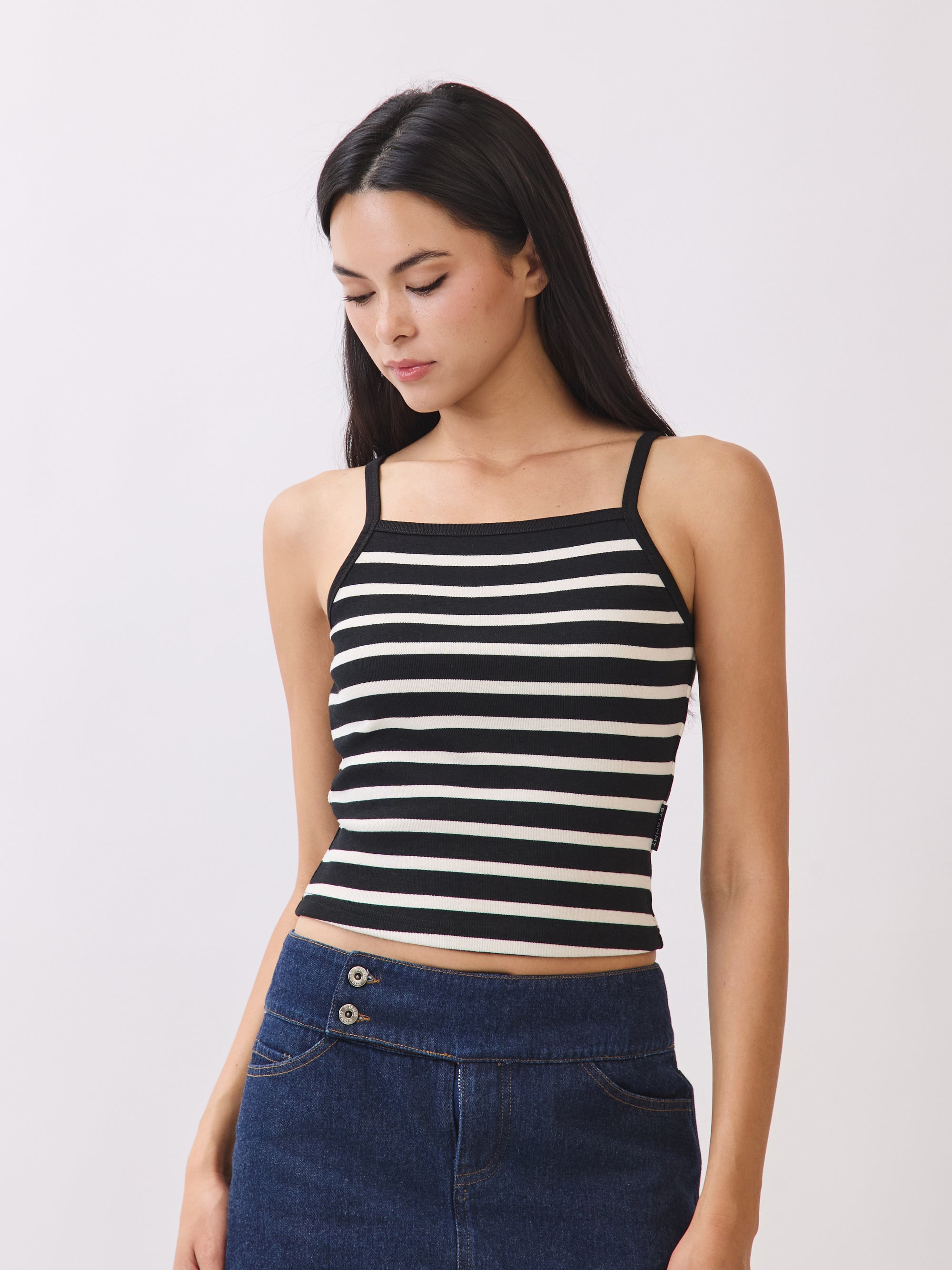 BTTRMMT Ivory and Black Striped Ribbed Tank Top – close-up of square neckline paired with denim mini skirt.