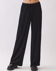 BTTRMMT Black Calia Pants front view with relaxed straight-leg fit and comfortable elastic waistband