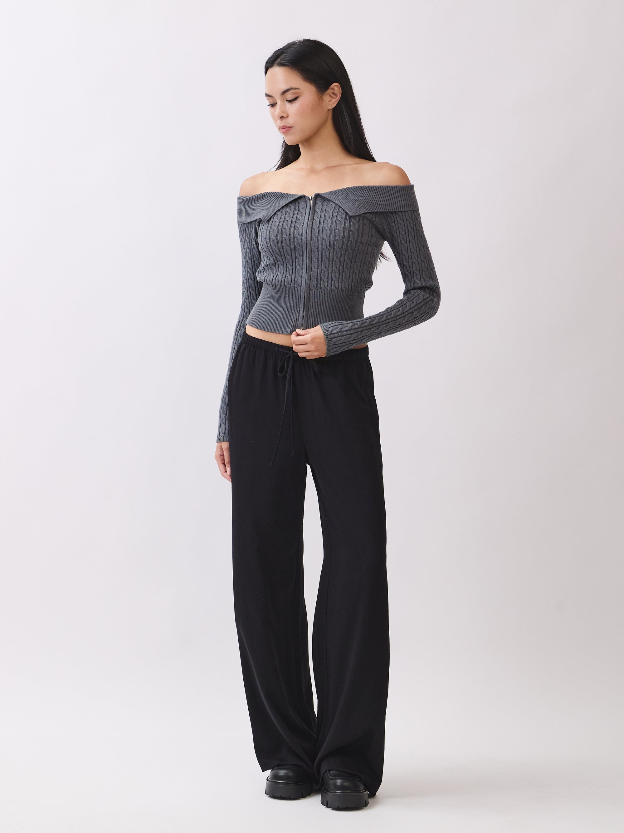 BTTRMMT Black Calia Pants styled with Camille Zip Knit, featuring a relaxed wide-leg fit for an effortless everyday look.