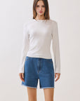 BTTRMMT White Selene Rib Tee front view with fitted silhouette, long sleeves, and ribbed texture