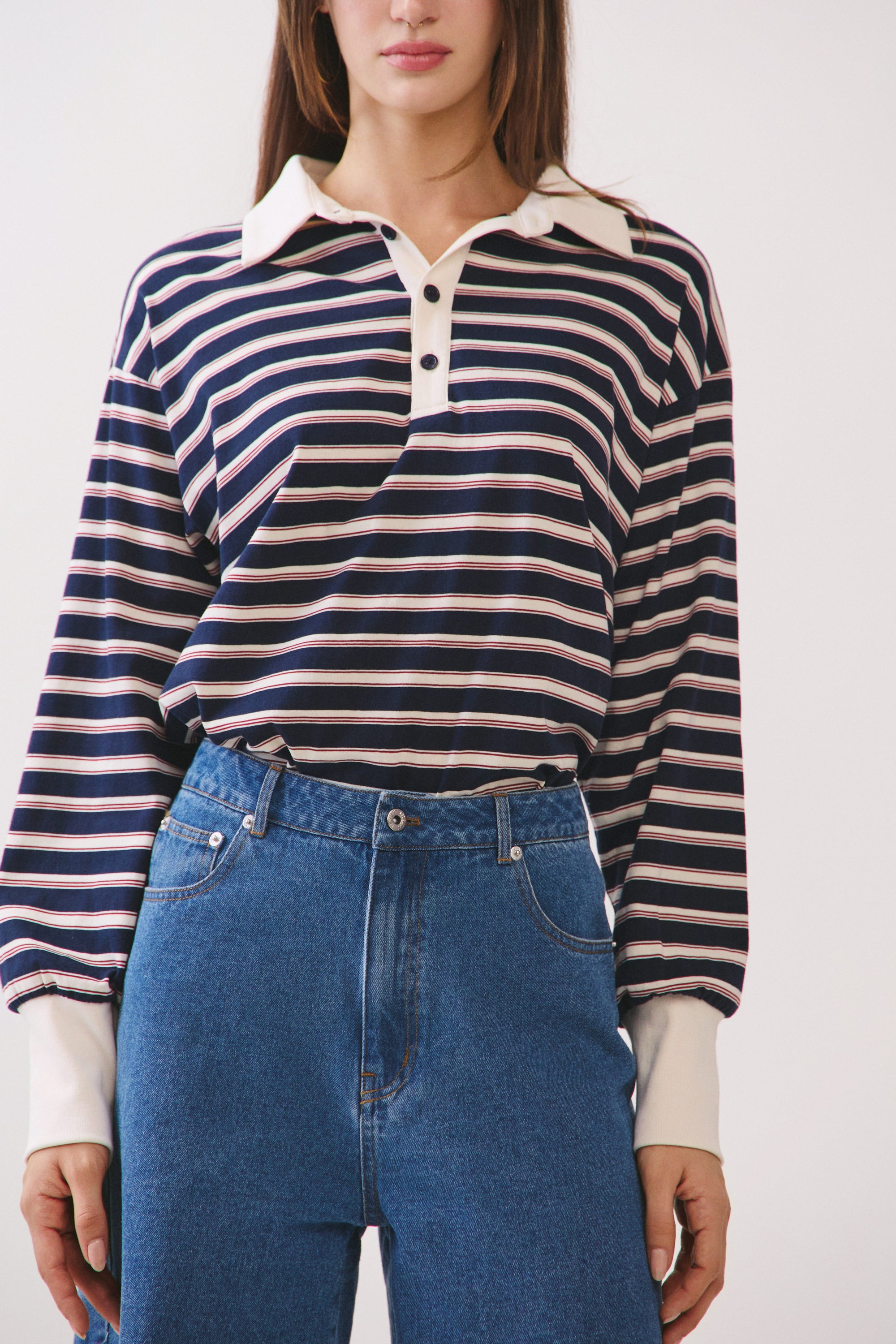 BTTRMMT Sloan Striped Long Sleeve Polo close-up highlighting contrast collar, button placket, and stripe detail