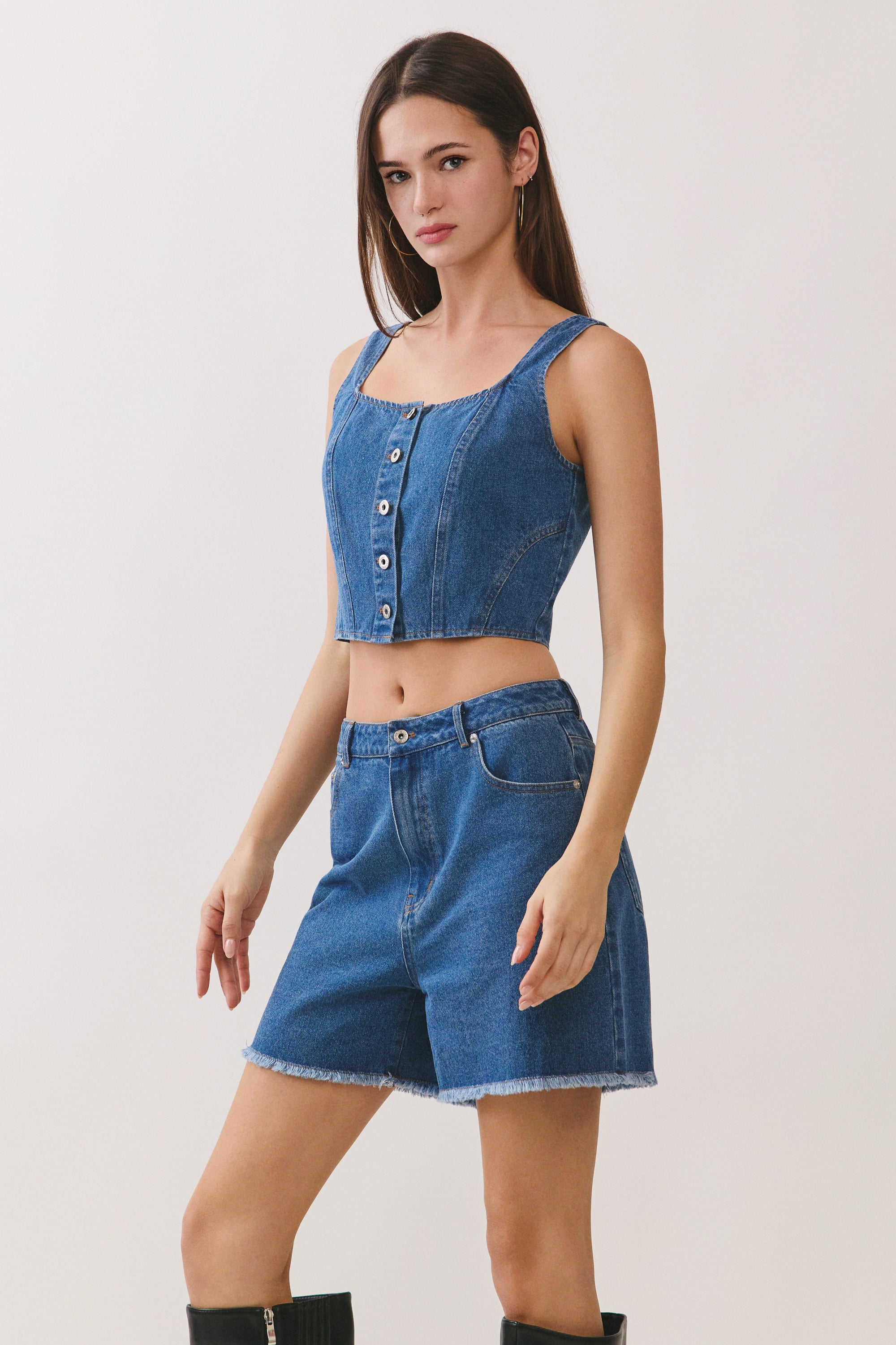 BTTRMMT Rae Structured Denim Top side view showing structured denim fit, clean seams, and cropped silhouette