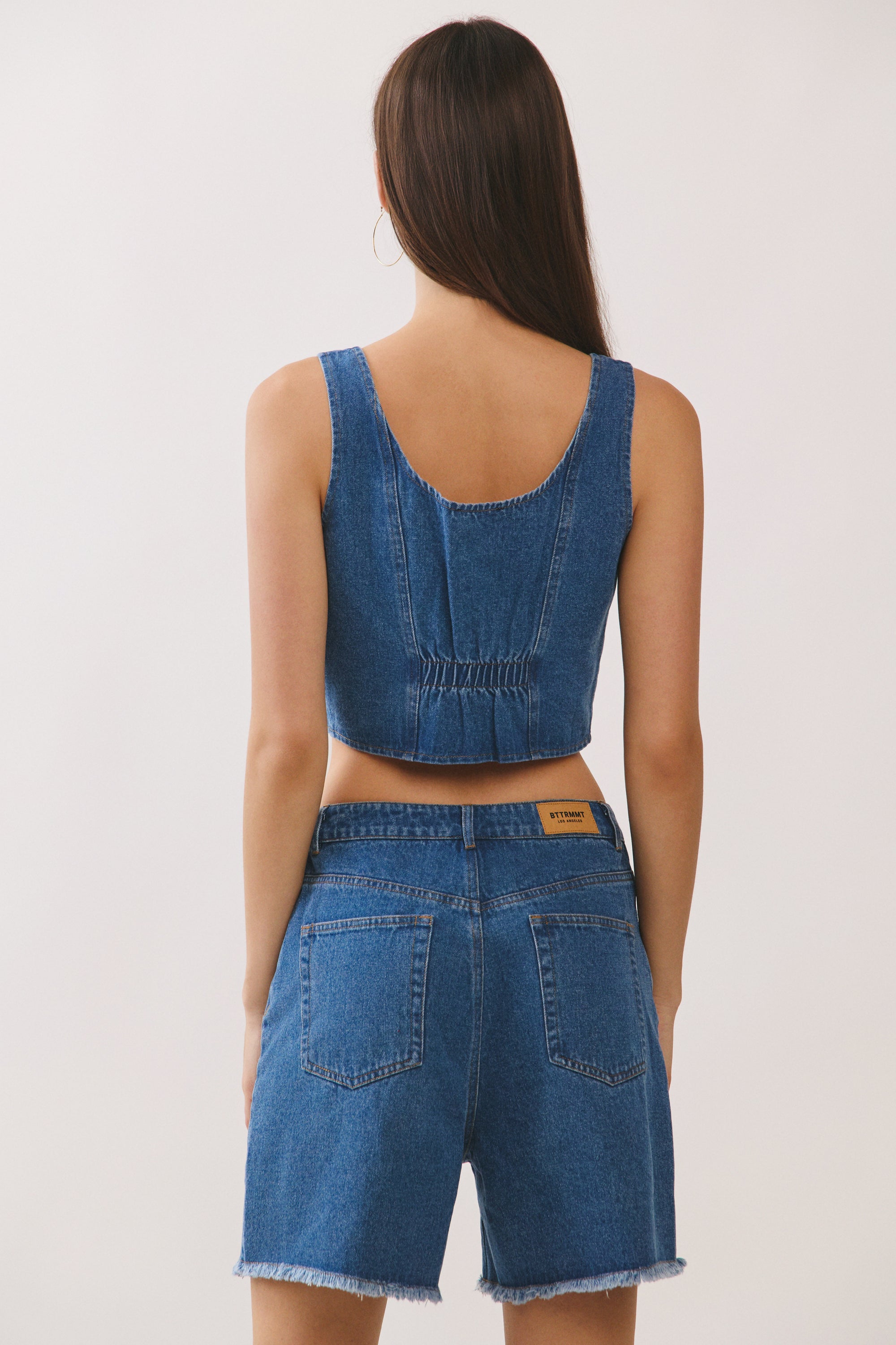 BTTRMMT Rae Structured Denim Top back view highlighting tailored denim construction and smooth cropped finish