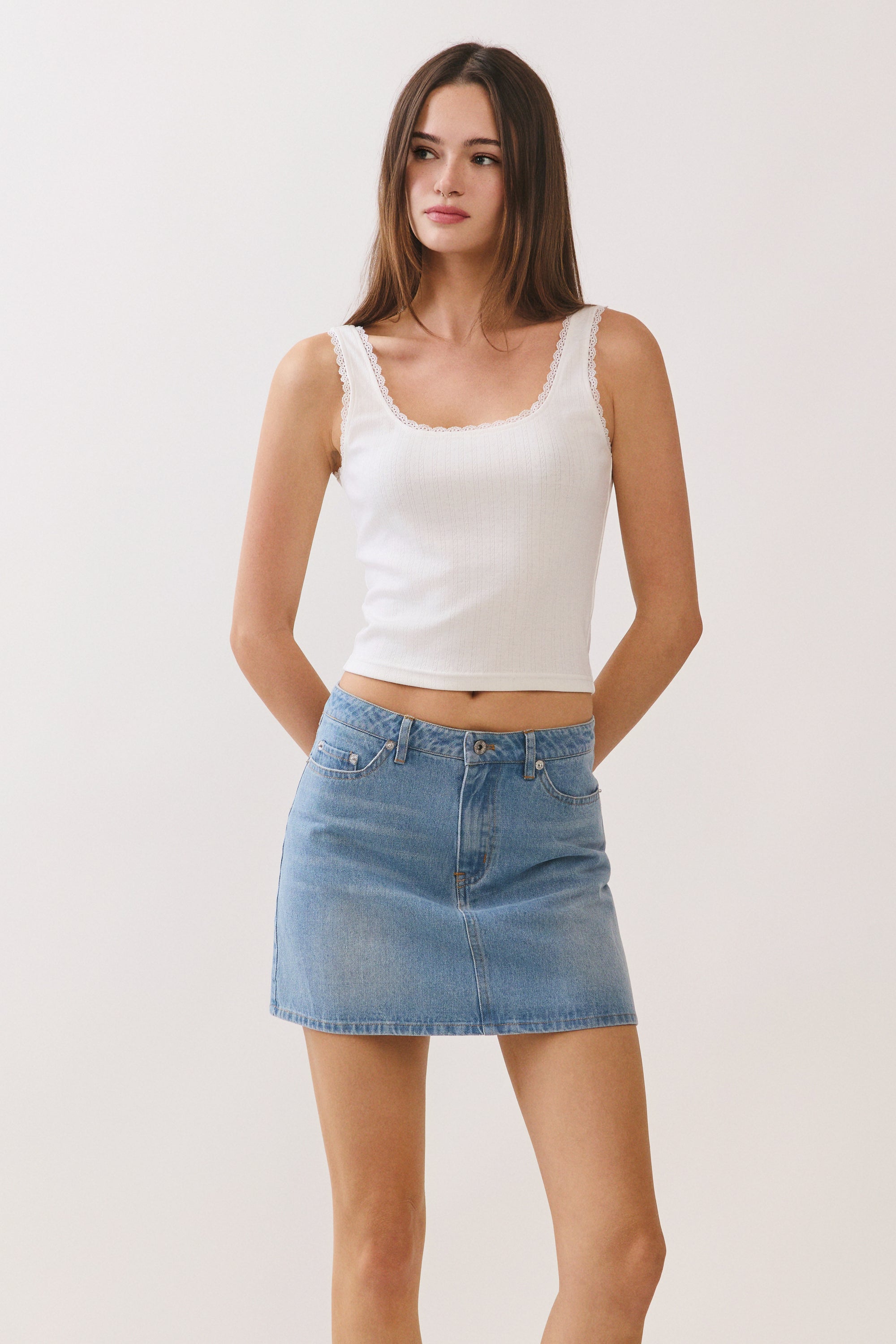 BTTRMMT Tate Everyday Denim Skirt front view, high rise mini denim skirt with clean straight fit