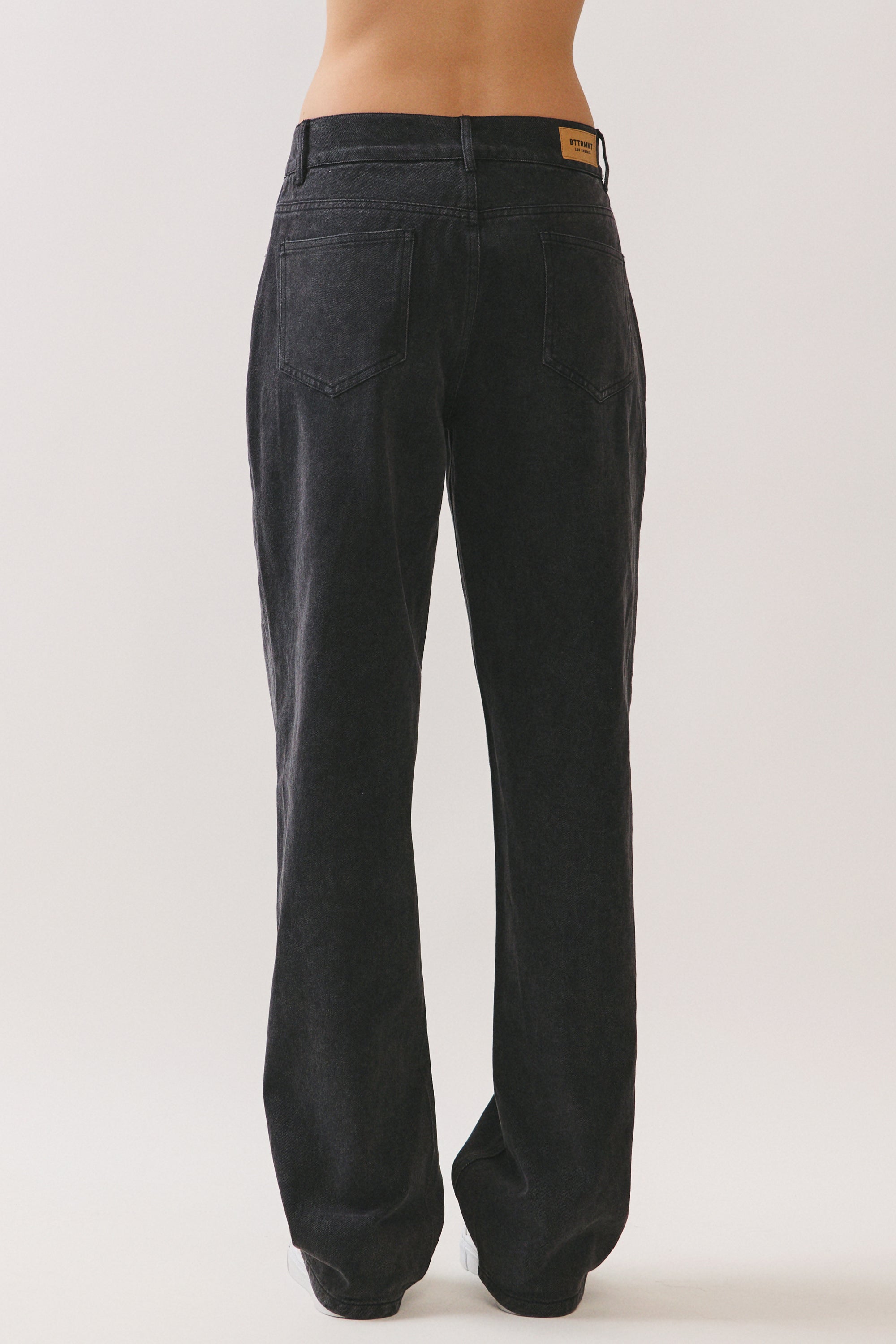 BTTRMMT Evie Mid-rise Washed Black Denim Jeans featuring back pockets, clean stitching, and relaxed everyday fit.