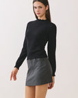 BTTRMMT Suri Ruffle Neck Knit Top side view highlighting slim fit and long sleeves