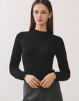 BTTRMMT Suri Ruffle Neck Knit Top front view with fitted silhouette and ruffle neckline