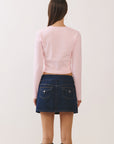 BTTRMMT Pink Sophie Ribbed Button Cardigan back view highlighting clean back design and fitted silhouette