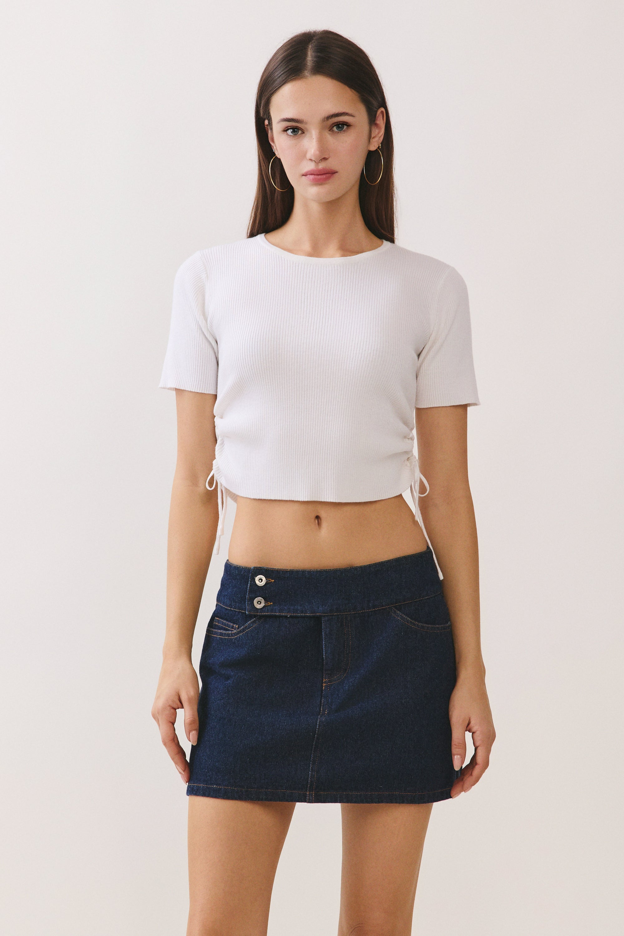 BTTRMMT The Line Knit Tee front view with fitted silhouette, short sleeves, and soft knit texture