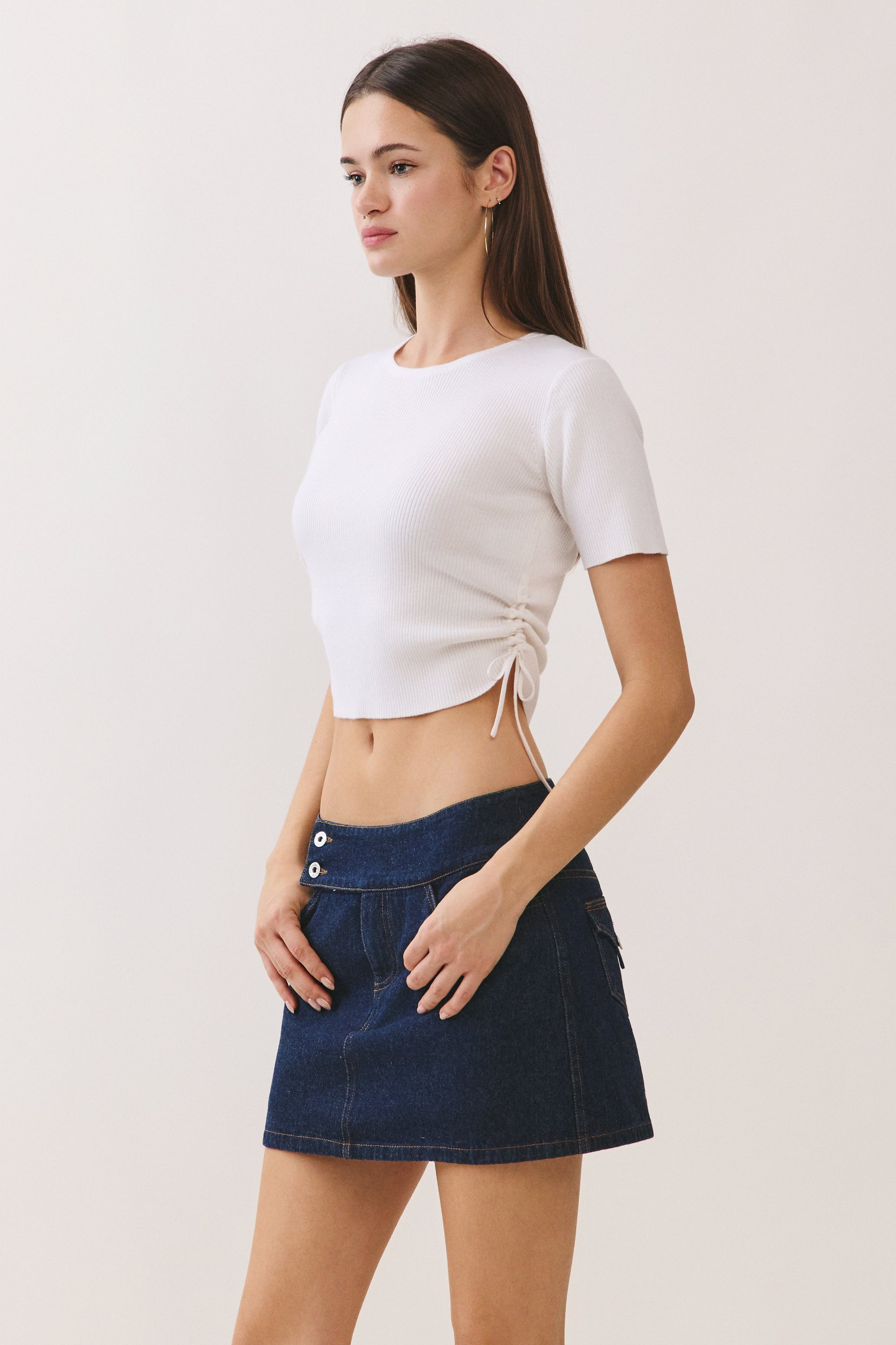 BTTRMMT The Line Knit Tee side view highlighting cropped length and clean ribbed knit