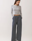 BTTRMMT Ellie Striped Pants front view featuring navy and white stripes, relaxed wide-leg fit and elastic waistband