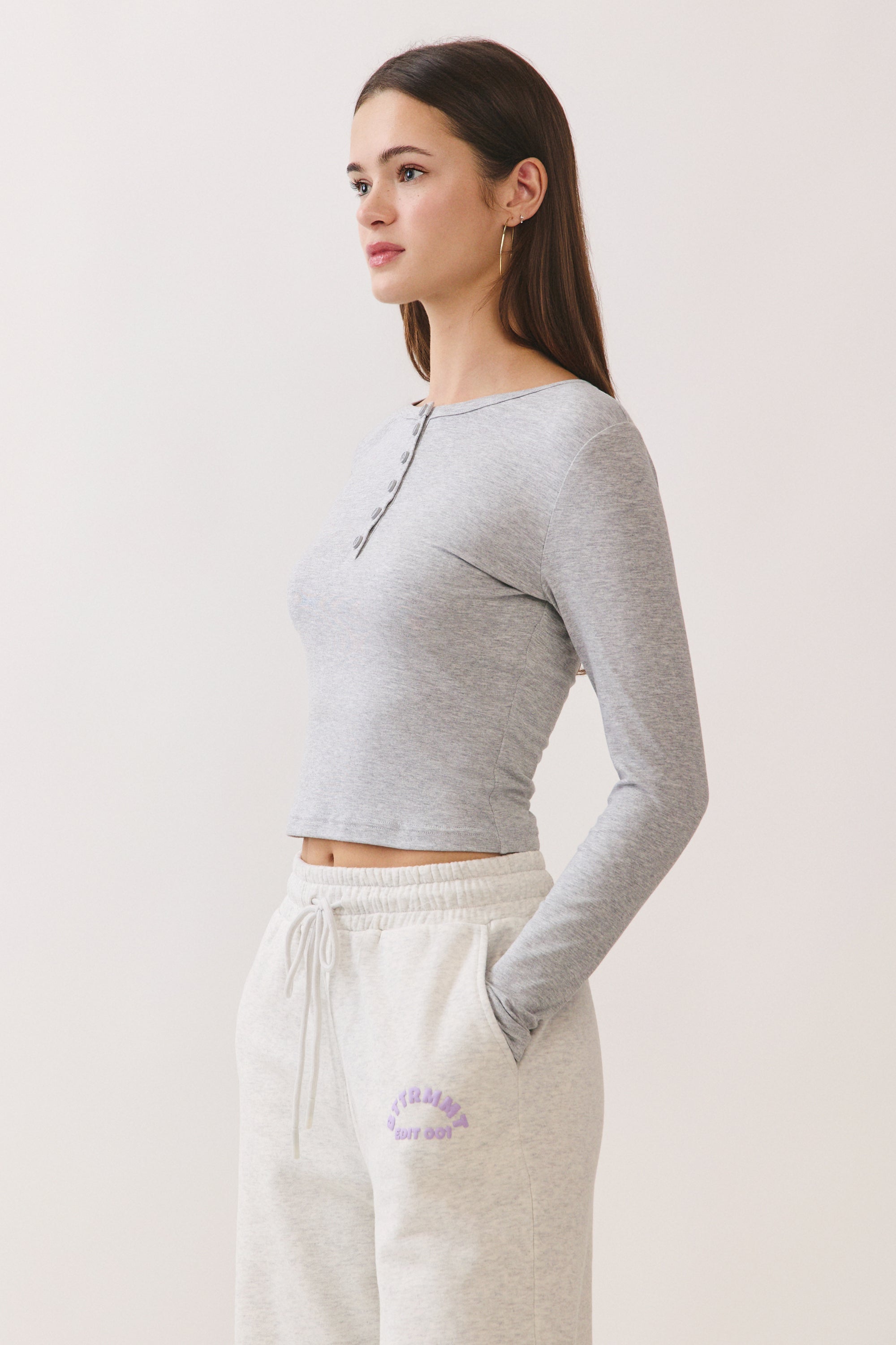 BTTRMMT Gray Aubree Henley Top side view showing fitted silhouette, cropped length, and lightweight ribbed material