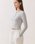 BTTRMMT Gray Aubree Henley Top side view showing fitted silhouette, cropped length, and lightweight ribbed material