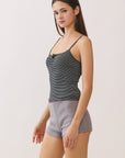 BTTRMMT Black Lina Striped Button Tank shown from side with fitted silhouette and thin shoulder straps