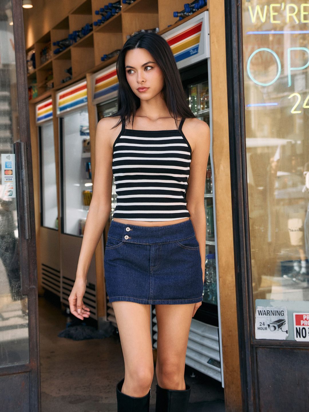BTTRMMT Ivory/Black Rylee Striped Tank Top front view worn in downtown Los Angeles with fitted cropped silhouette