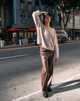 BTTRMMT Vera Faux Leather Pants styled on model in downtown Los Angeles street