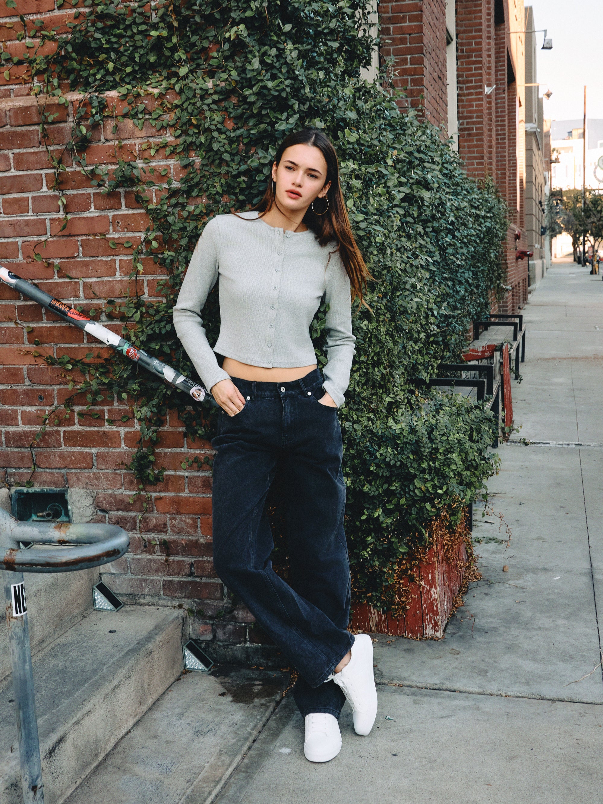 BTTRMMT Evie Mid-rise Washed Black Denim Jeans with relaxed straight-leg fit styled casually outdoors