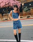 TTRMMT Rae High Rise Denim Shorts styled casually with boots for an effortless everyday denim look