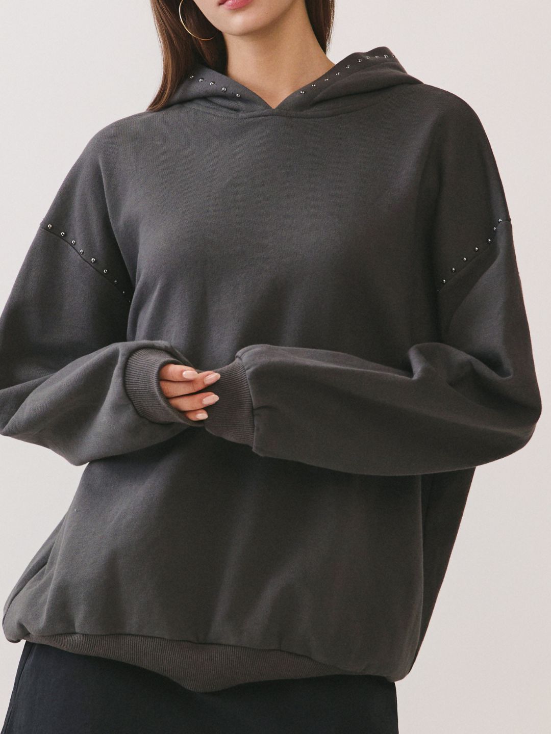 BTTRMMT Reese Studded Hoodie close-up of stud detailing along sleeves and soft fabric texture