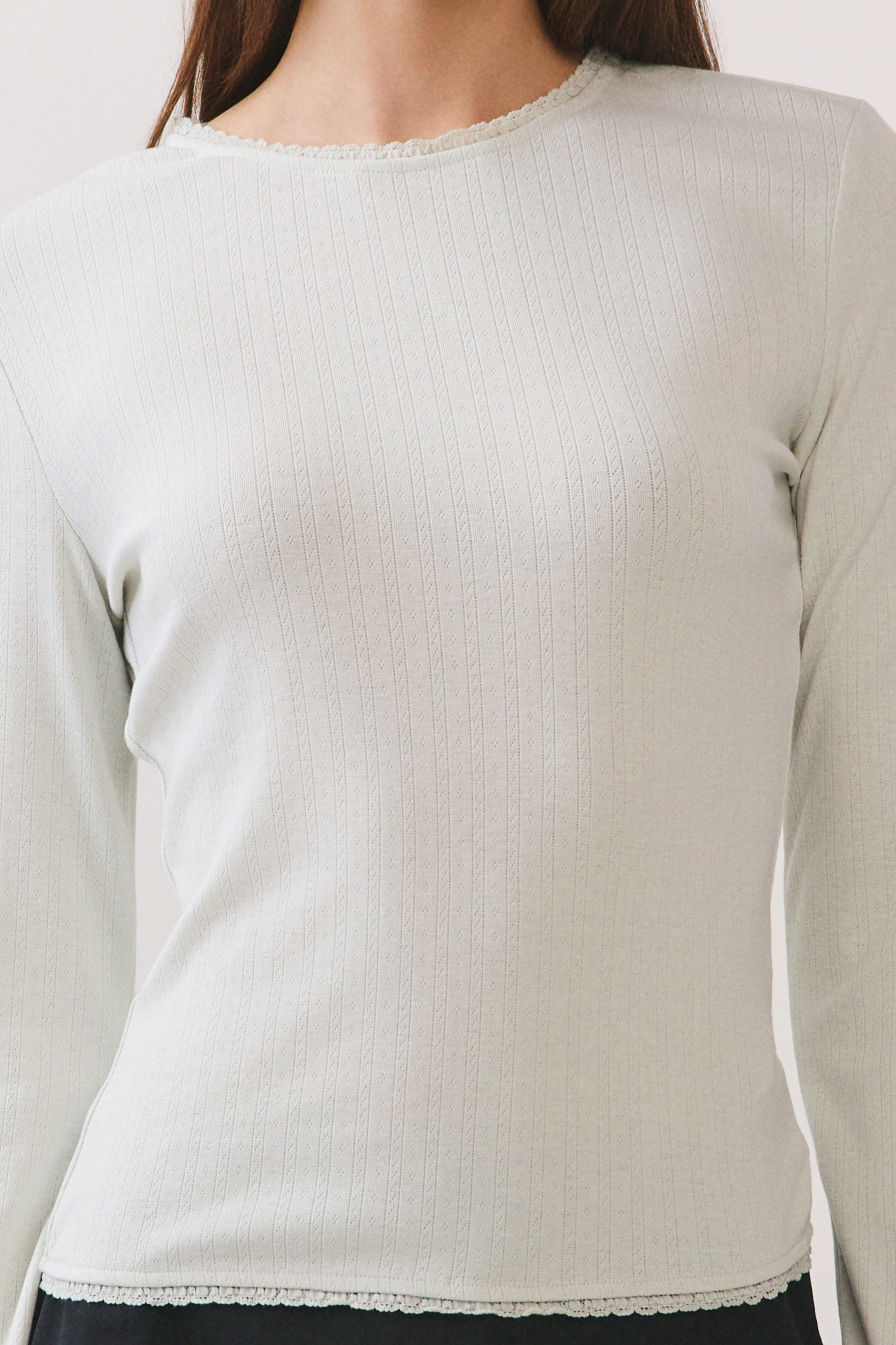 BTTRMMT Sage Green Selene Rib Tee close-up highlighting soft ribbed texture and subtle neckline trim