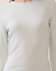 BTTRMMT Sage Green Selene Rib Tee close-up highlighting soft ribbed texture and subtle neckline trim