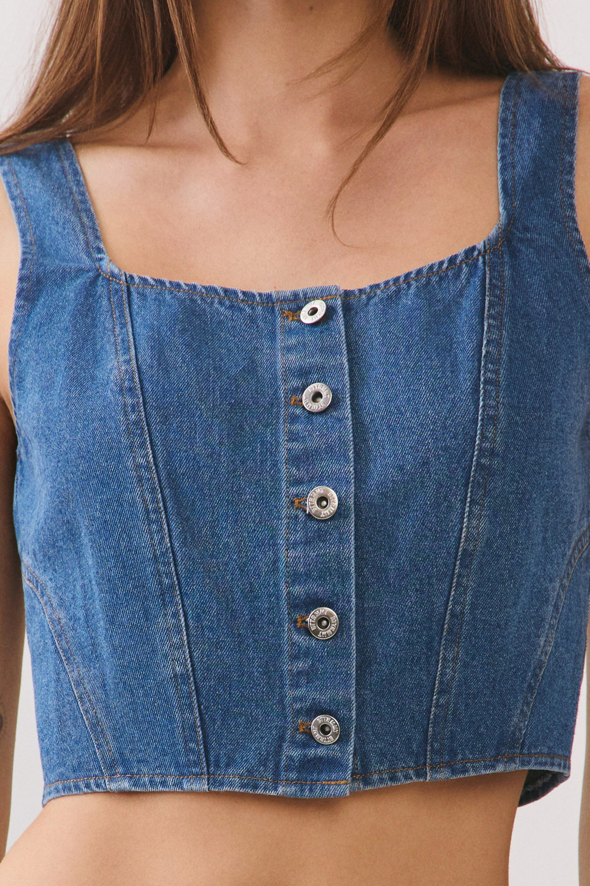 BTTRMMT Rae Structured Denim Top Close up view with square neckline, button-front detail, and cropped structured fit