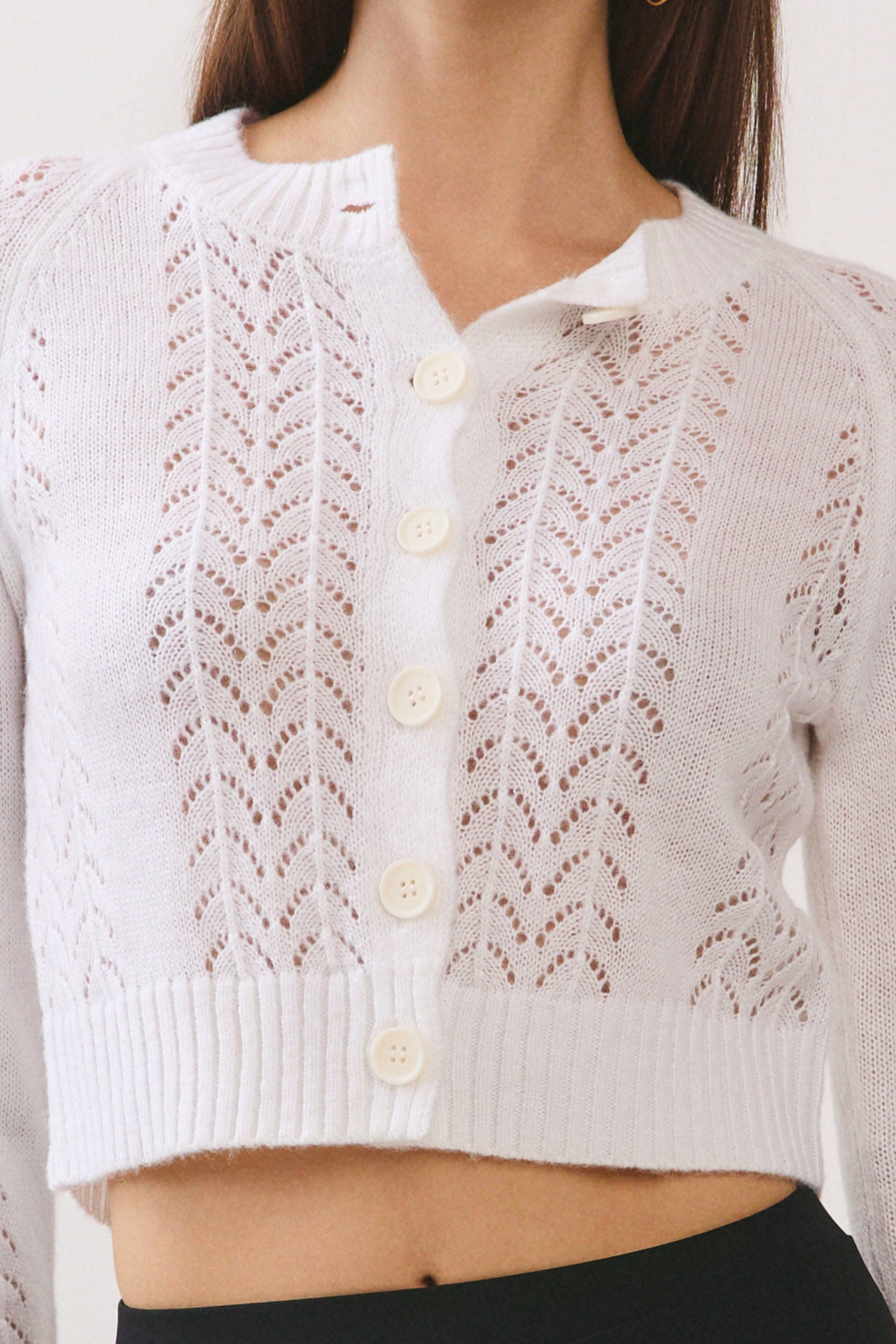 BTTRMMT lila lace cardigan close-up showing lace pattern, button detail, and soft knit fabric